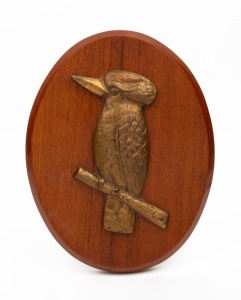 A vintage Australian bronze kookaburra plaque, mounted on oval timber panel, 20th century, 28cm high