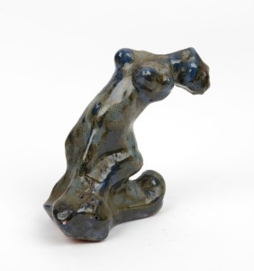 ARTIST UNKNOWN blue glazed pottery figure of a reclining female nude, incised "J. A.", 17cm high