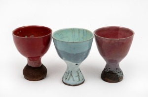 JOHN PERCEVAL three assorted pottery goblets glazed in burgundy, green and blue, all incised "Perceval", the largest 10.5cm high