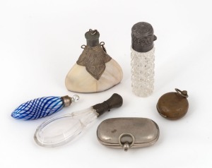 A Nailsea&nbsp;blue glass scent bottle, two silver topped scent bottles, a shell scent bottle and two sovereign cases, 19th/20th century, (6 items), ​​​​​​​the largest 10cm high