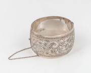 An&nbsp;engraved sterling silver bangle, 20th century, stamped "Scandia, Sterling"