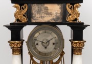 An antique Viennese mantle clock in ebonized Empire architectural case with alabaster columns and water gilt capitals plus griffins and eagle finial. 30 hour quarter gong striking movement with silk suspension and finely engine turned dial, circa 1840, 76 - 3