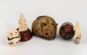 An antique Japanese Meiji Daruma Kobe with English sterling silver mount, a carved ivory netsuke, a Japanese&nbsp;figural ceramic brush washer, and two Indian carved ivory miniature statues, (5 items), the brush washer 5cm high