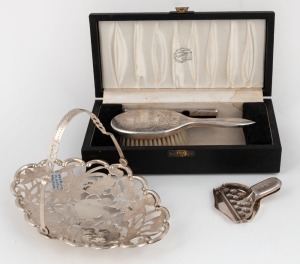 TACKHING Chinese export silver lemon squeezer, TIENSIN Chinese export silver bonbon basket, plus a Chinese export silver brush and comb set in original retailer's case branded J.A. WINDSOR & Co. HONG KING, the case 22.5cm wide, approximately 250 grams silver weight