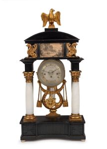 An antique Viennese mantle clock in ebonized Empire architectural case with alabaster columns and water gilt capitals plus griffins and eagle finial. 30 hour quarter gong striking movement with silk suspension and finely engine turned dial, circa 1840, 76cm high