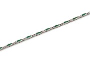 An 18ct white gold, emerald and diamond set tennis bracelet, late 20th century, stamped "750", 18cm long, 15 grams - 2