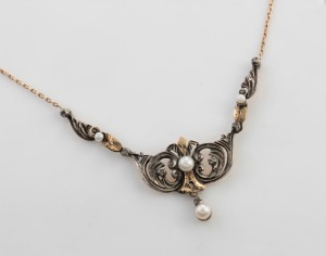 A 14ct gold and silver negligee necklace adorned with pearls and diamonds, early 20th century, 40cm long, 8.6grams