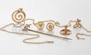 A 9ct gold lion stickpin, a 9ct gold stud, a 9ct gold chain, 14ct gold earrings and pendant, ​​​​​​​9.7 grams total