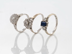 Three 18ct white gold and diamond rings, one set with a blue sapphire, 20th century, stamped 18ct or 750, 9.5 grams total
