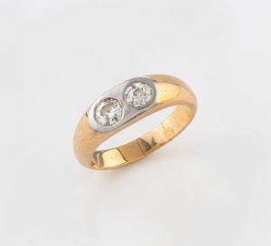 A 14ct gold ring, set with two diamonds, 20th century, stamped "585", 9 grams