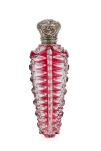 An antique ruby overlay scent bottle with engraved silver cap and original glass stopper, 19th century, 10cm high overall