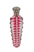 An antique ruby overlay scent bottle with engraved silver cap and original glass stopper, 19th century, 10cm high overall