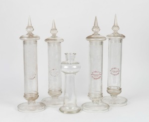 NOBEL'S EXPLOSIVES COMPANY LIMITED, GLASGOW: Group of four antique lidded glass jars, all branded; together with an antique glass chemist's bottle with registration mark stamped to base, 19th/20th century, (5 items), the largest 41cm high