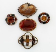 Five assorted Scottish agate and carnelian&nbsp;brooches with sterling silver and gilt metal mounts, (two set with faceted cut stones) 19th/20th century, ​​​​​​​the largest 7cm wide