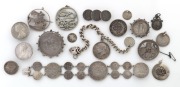 COIN JEWELLERY. A group of assorted silver coins of the world, mounted as brooches, pendants, bracelet, buttons etc, mixed vintages, (17 items), 262 grams total