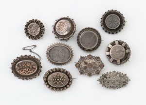 Ten antique silver brooches, two with rose gold highlights, 19th century, the largest 4.5cm wide, 64 grams total