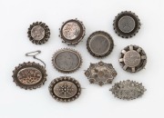 Ten antique silver&nbsp;brooches, two with rose gold highlights, 19th century, ​​​​​​​the largest 4.5cm wide, 64 grams total