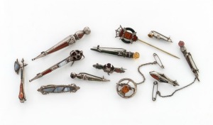 Eleven assorted Scottish stone and silver brooches and a stickpin, 19th/20th century, (12 items), the largest 7cm long