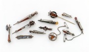 Eleven assorted Scottish stone and silver brooches and a stickpin, 19th/20th century, (12 items), ​​​​​​​the largest 7cm long