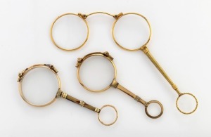 Three antique gold finished lorgnettes, 19th century, the largest 12.5cm high
