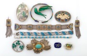 A Chinese filigree silver, enamel and carved ivory brooch (missing clasp), a Chinese silver enamel and carved ivory locket, together with assorted silver and enamel bracelets, earrings and brooches, mostly 20th century, (12 items)
