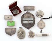 An antique sterling silver belt buckle and fittings, a Mexican silver shaving kit, four assorted trinket boxes (one with green enamel top), a silver pendant mirror, and a French white metal and brass pocket mirror, 19th and 20th century, (8 items), 216 gr