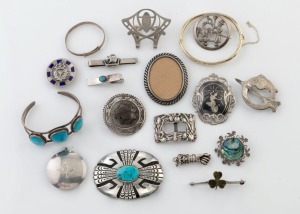 Assorted silver brooches, bangles, shoe buckle, fist pendant, kilt pin, enamel brooch, turquoise jewellery, etc. 19th and 20th century, (18 piece)