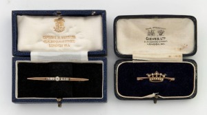 A 15ct gold bar brooch, set with seven white diamonds, together with a yellow gold crown brooch, set with seed pearls, early to mid 20th century, (2 items), the diamond brooch 5.5cm wide, 4.9 grams total