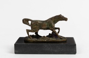 A bronze horse statue on black marble base, signed "P. J. M&ecirc;ne", 8cm high, 12cm long