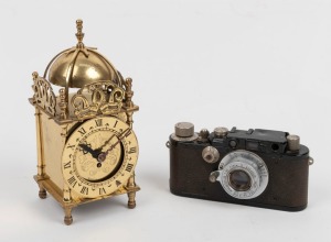 Leica Russian copy camera, together with a reproduction brass lantern clock with quartz movement, 20th century, (2 items), the clock 18cm high