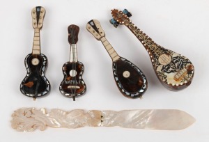 Four assorted miniature instrument ornaments made from tortoiseshell, bone and mother of pearl; together with an attractively carved antique mother of pearl paper knife, 19th and 20th century, (5 items), the knife 24cm long