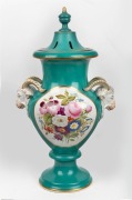 An antique English green porcelain potpourri urn with ram's head decoration and hand-painted floral cartouche, 19th century, 62cm high