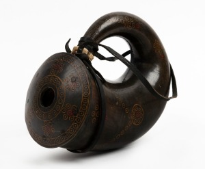 An antique tribal folk art powder horn with circular inlaid decoration and horn tip, Dagestan origin, 19th/20th century, ​​​​​​​20cm long