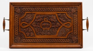 An antique English folk art carved oak wedding tray, 19th century, ​​​​​​​64cm wide