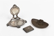 An antique 800 Continental silver pocket watch stand, a sterling silver card case, an a French bronze dish with ram's head decoration, 19th and 20th century, 117 grams silver weight