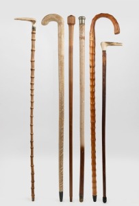 Six assorted vintage walking sticks including deer antler and bamboo, snakeskin covered, bamboo and Chinese penwork, plus painted full Malacca,20th century, the largest 93cm high