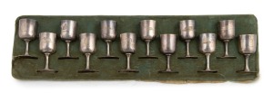 BRITISH ANTARCTIC "NIMROD" EXPEDITION 1907 - 1909:  A remarkable, complete set of twelve sterling silver wine goblets (7cm high), presented on a felt board (which would have once fitted into a timber case). Each goblet (made by Stewart Dawson & Co) is eng