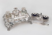 Two antique English desk sets, one sterling silver the other Sheffield plate, 19th century, the larger 30cm wide