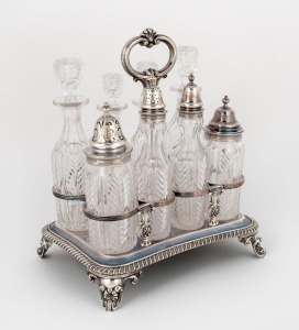A Sheffield plate cruet stand housing eight antique crystal bottles with sterling silver tops, 19th century, 26cm high