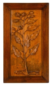 An Australian Arts & Crafts timber panel, carved with gumnuts, leaves and blossoms, signed in the lower margin "R.W.S., 1915", 66 x 38cm