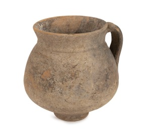 A Roman pottery wine jug, 1st century, A.D., 10.5cm high