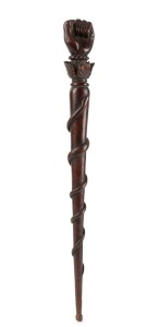 An antique Australian stock whip handle with carved fist end, rope twist and acanthus decoration, plus carved snake adornment, 19th century, 46cm long