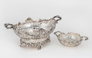 Two antique English sterling silver serving baskets, one example (larger) by William Comyns of London, the larger 28cm wide, 976g total