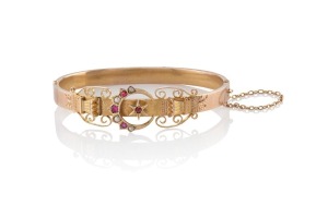 WILLIS & SONS of Melbourne antique 9ct gold bangle, set with pearls and red stones, 19th century, stamped "9.W." with unicorn mark, ​​​​​​​6.5cm wide, 8.5 grams