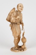 A fine quality antique Japanese carved ivory Okimono of a fisherman with his cormorant, Meiji Period, red seal mark to base, 15.5cm high - 2