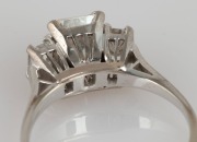 An impressive 18ct white gold ring with 1.3 carat central emerald cut diamond flanked by two emerald cut diamonds, stamped "750" - 3