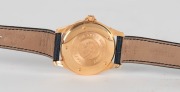 OMEGA "De Ville" chronometer automatic co-axial escapement gent's wristwatch in 18ct gold case with original leather strap and 18ct gold clasp, limited edition No. 232/999, with box and papers; together with an AUDEMARS PIGNET automatic wristwatch winder, - 2