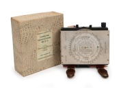 RAAF Mk. III D manual operation aircraft navigation computer [#3607] in original box, c. 1940s, with straps for wearing on pilot's leg. Manufactured in Melbourne by White & Gillespie.