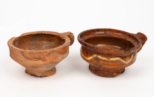 An antique Dutch pottery cup with trailing slip glaze; together with a similar undecorated example, 17th century, (2 items) the larger 6.5cm high, 12.5cm wide