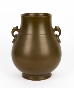 A Chinese porcelain vase with olive green glaze, 20th century, square seal mark to base, 27cm high